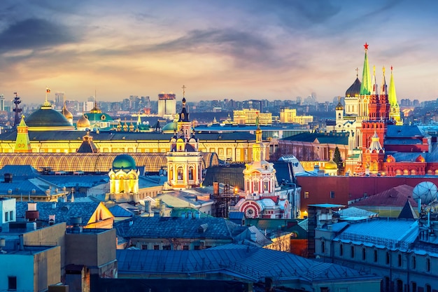 Aerial sunset view of the center of Moscow with historical Museum, The Cathedral of Christ the Savior, government and other. World famous Moscow landmarks for tourism and travel.