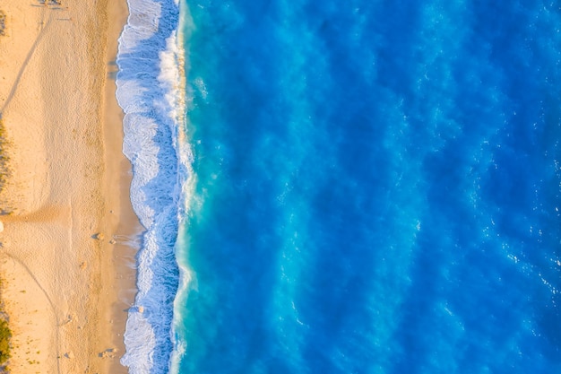 Aerial top down view of turquoise waters of Milos Beach Lefkada island Greece