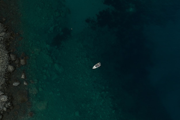 aerial top nature view drone above yacht turquoise adriatic sea in albania. panoramic view marine