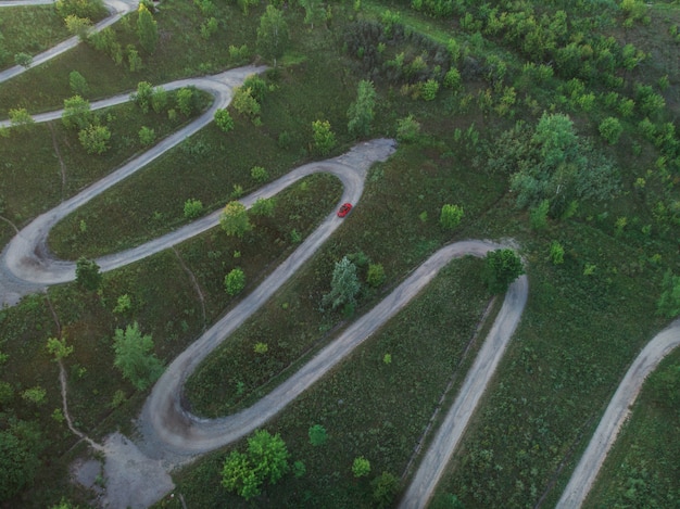 Aerial top vew of winding road in the city