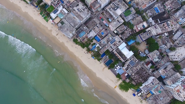 Aerial top view of beach in china small town in Hainan in China