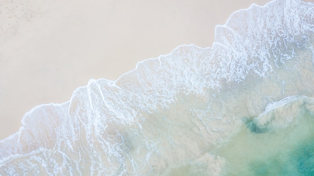 Aerial top view beautiful sea landscape, beach and wave with turquoise sea water