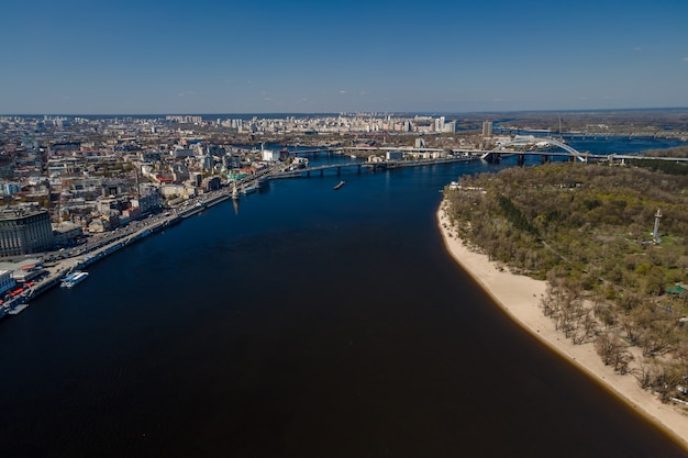 aerial top view by drone of kyiv cityscape and dnieper river in kiev city ukraine
