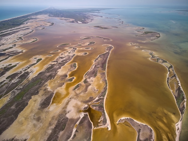 Aerial top view of islands and shallows on the Sivash salt lake near the sea of Azov