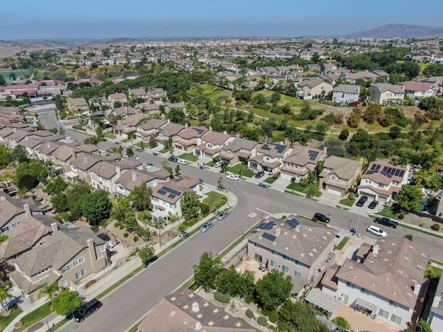 Aerial top view of middle class neighborhood with villas in South California USA