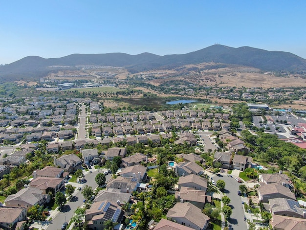 Aerial top view of middle class neighborhood with villas in South California USA