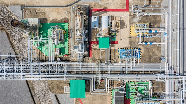 Aerial top view natural gas pipeline, gas industry, gas transport system, stop valves and appliances for gas pumping station.