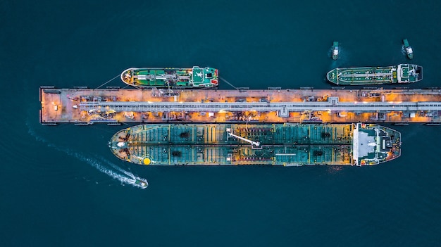Aerial top view of oil tanker ship at the port