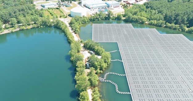 Aerial top view of renewable energy eco technology electric power industry solar panels on floating