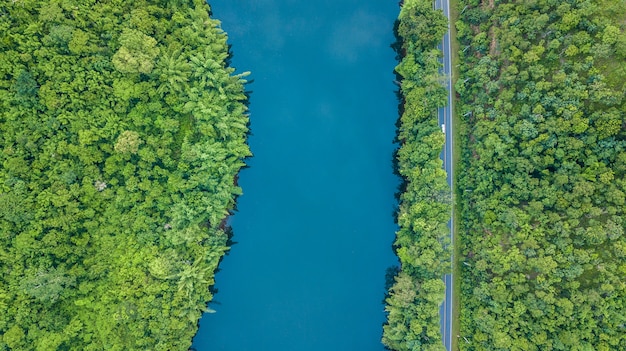 Aerial top view road track with car and river