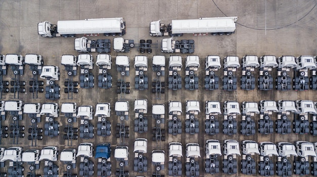 Aerial top view semi trailer truck lorry cargo vehicle Large freight transporter semi truck on the road Semi truck parking lot