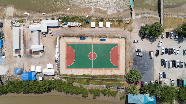 Aerial top view of soccer football or basketball courts in the island at Phangnga Thailand.