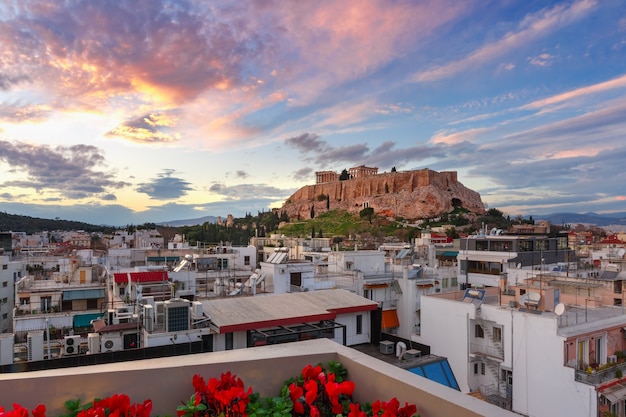 Aerial view of the Acropolis Hill, crowned with Parthenon at gorgeous sunset in Athens, Greece