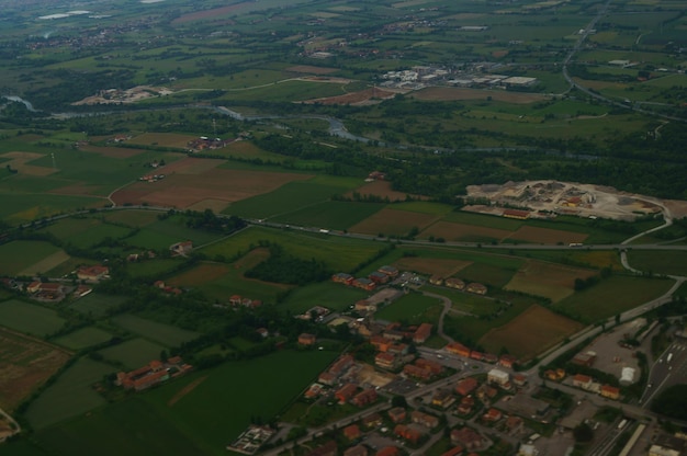 Photo aerial view of agricultural field against sky