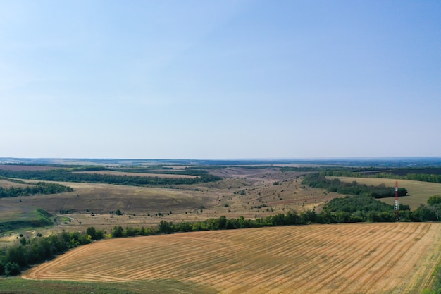 Aerial view of agricultural fields on sunny day