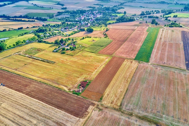 Aerial view of agricultural and green fields in countryside