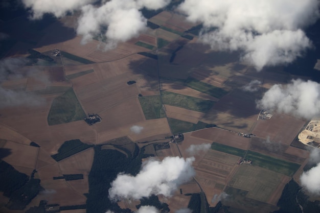 Photo aerial view of airplane flying in sky