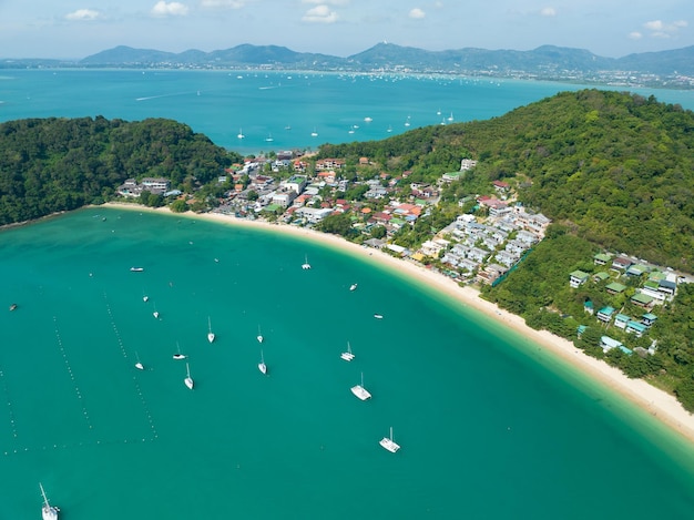 Aerial View Amazing sea with travel boatssailing boats in the seaBeautiful sea in summer season at Phuket island Thailand Travel boatsOcean during summer landscape