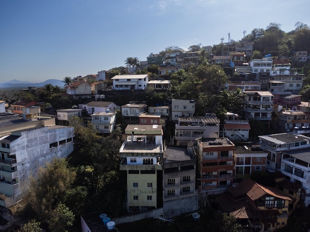 Aerial view of Barra de Guaratiba west zone of Rio de Janeiro Brazil Next to Marambaia beach Big hills around Sunny day at dawn Beach with clear water Barra de Guaratiba beach Drone photo