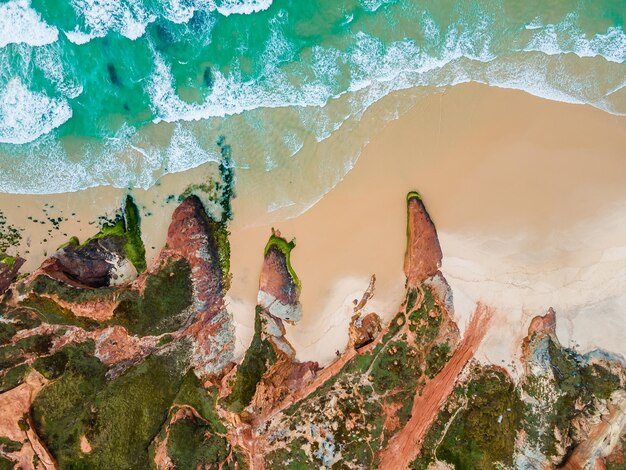 Aerial view of Beautiful ocean beach with cliffs in Portugal Baleal