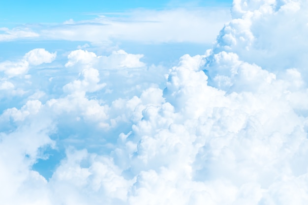 Aerial view of Blue sky and Cloud Top view from airplane window