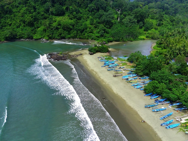 Aerial view of boats moored off Rajegwesi Beach Banyuwangi Indonesia