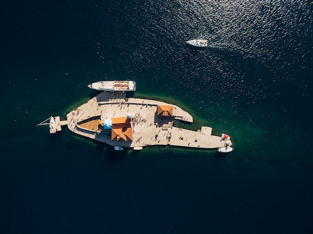 Aerial view of boats near the island of gospa od skrpjela montenegro