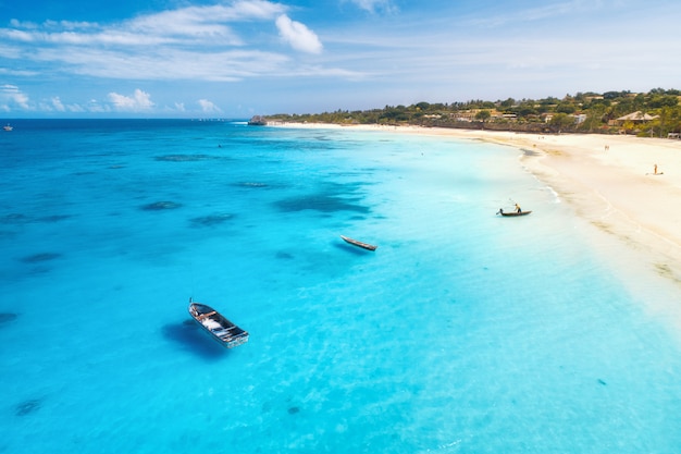 Aerial view of boats and yachts on tropical sea coast in summer