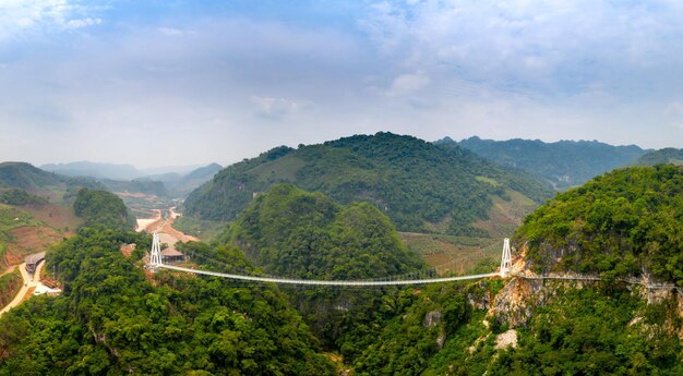 Aerial view of a bridge in the mountains photo