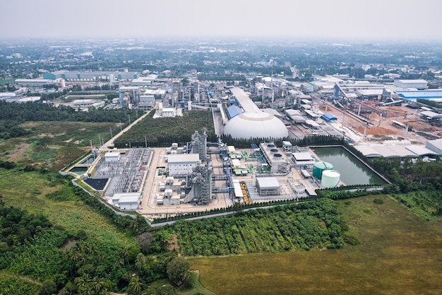 Aerial view of building infrastucture of industry power plant smart chamical gas and oil refinery pipeline warehouse in safety zone