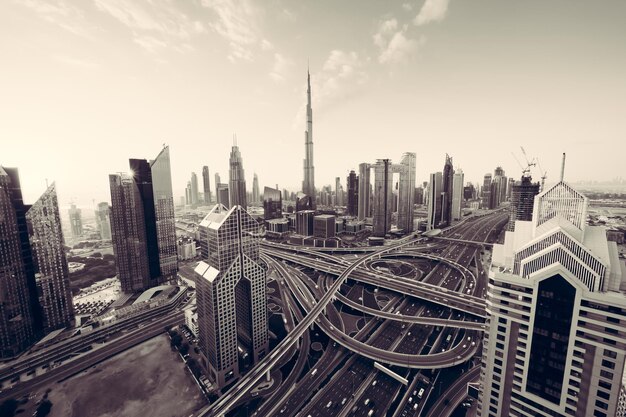 Photo aerial view of buildings in city against sky