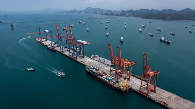 Aerial view bulk carrier dock global business import export
logistic and transportation company commercial dock container cargo
vessel freight shipping worldwide