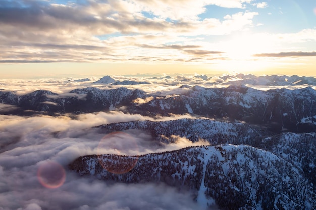 Aerial view of a Canadian Landscape during a winter sunset Nature Background