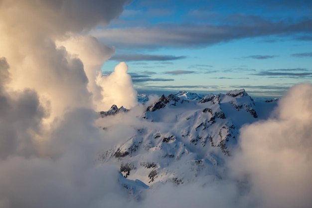 Aerial view of a Canadian Landscape during a winter sunset Nature Background