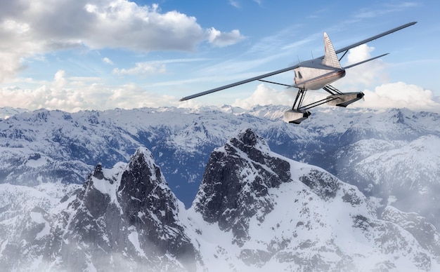 Aerial View of Canadian Rocky Mountain Landscape with Seaplane Flying