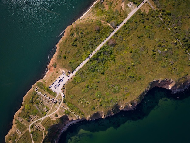 Aerial view of Cape Kaliakra Bulgaria's enchanting headland Marvel at the majestic cliffs ancient fortress and panoramic sea vistas that make this coastal gem truly captivating