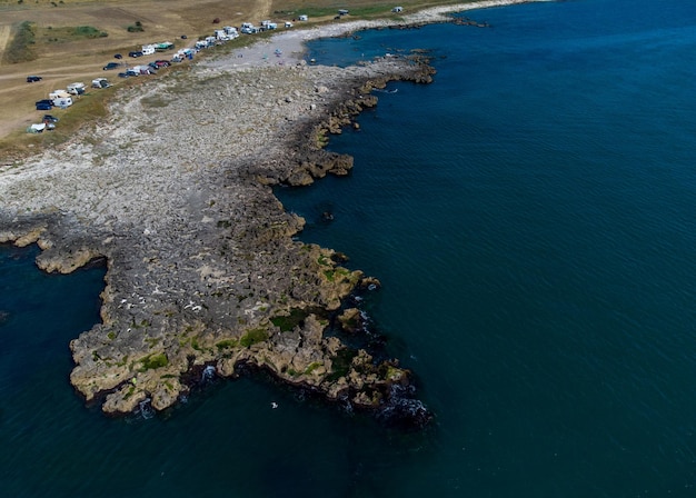 Aerial view of caravan campers on the sea cost at sunny day Black Sea Bulgaria