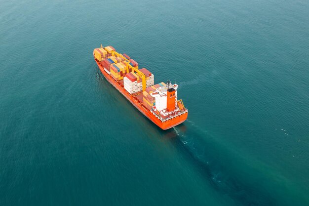 Aerial view of cargo container ship carrying containers for import and export business logistic and