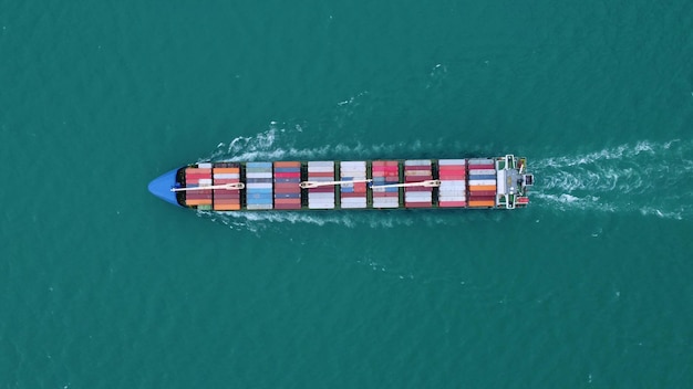 Photo aerial view of cargo container ship in the sea