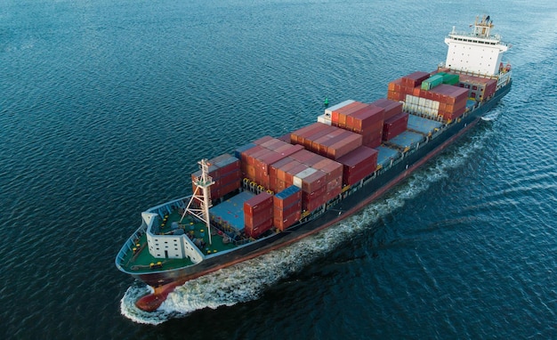 Aerial view of cargo container ship in the sea