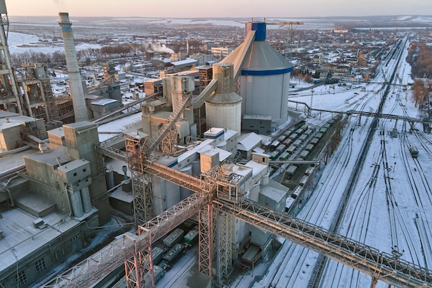 Aerial view of cargo train cars loaded with construction goods at mining factory Railway transportation of industrial production raw materials