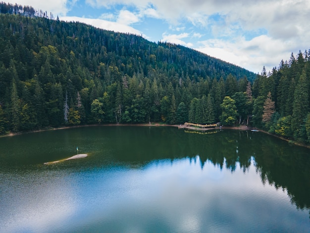 Aerial view of carpathian lake synevyr autumn season