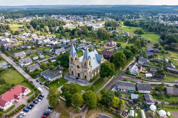 aerial view over church in countryside