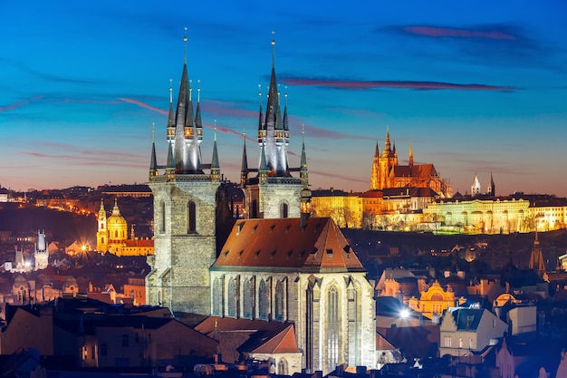 Aerial view over church of our lady before tyn old town and prague castle at night in prague czech r...