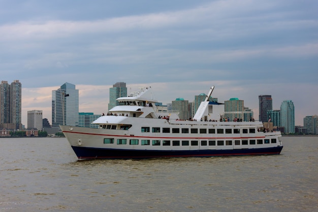 aerial view on of circle line sightseeing cruises with a boat around manhattan island with