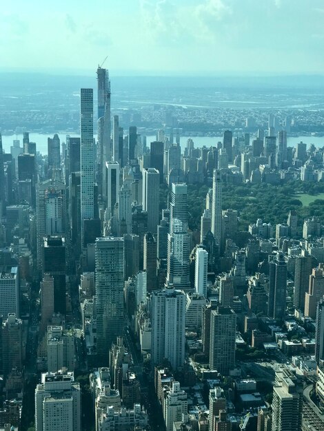 Aerial view of city buildings against sky