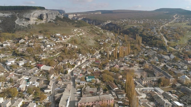 Aerial view of the city houses and roads with trees Urban landscape