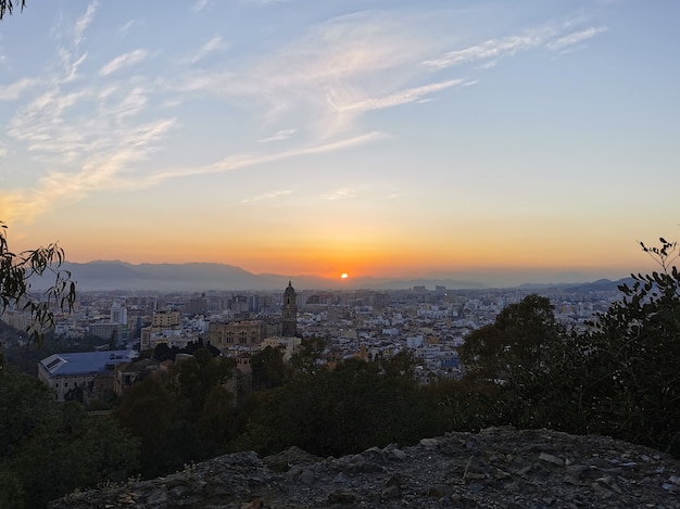 Aerial view of the city of malaga in spain at sunset