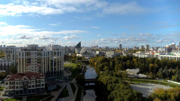 Photo aerial view of a city summer green park and a flowing river stock footage beautiful cityscape on a