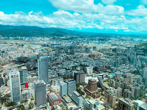 Aerial view of cityscape against sky